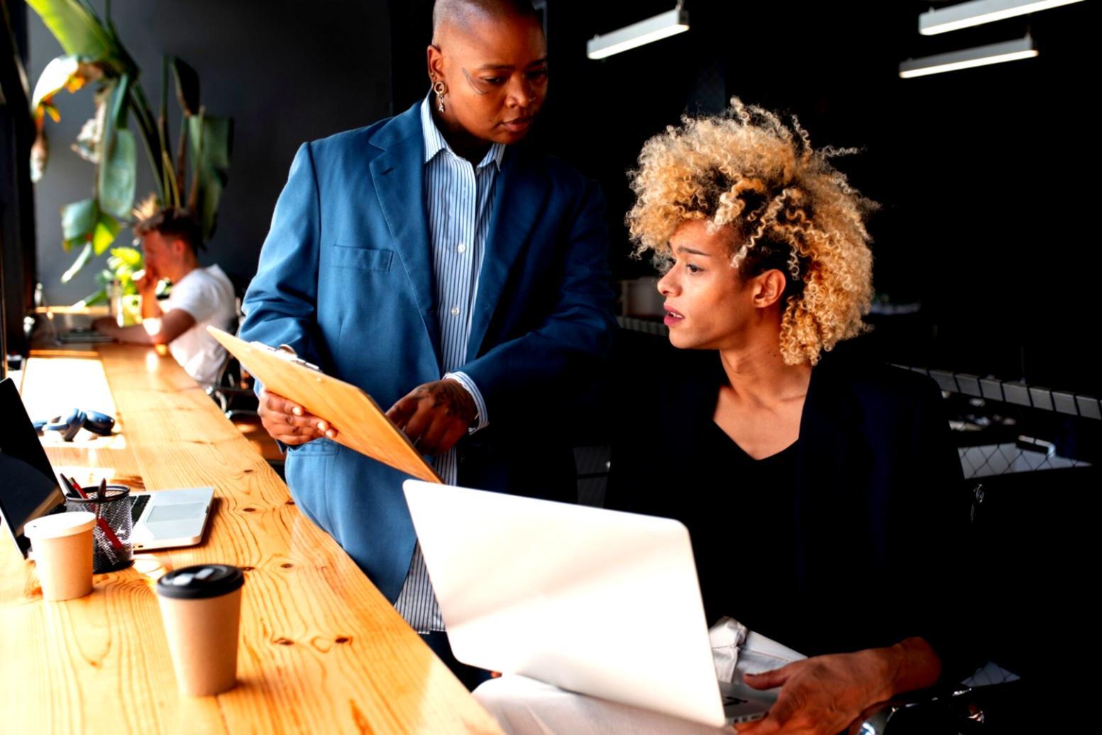 Budget planning workshop session with department managers collaborating on financial forecasts