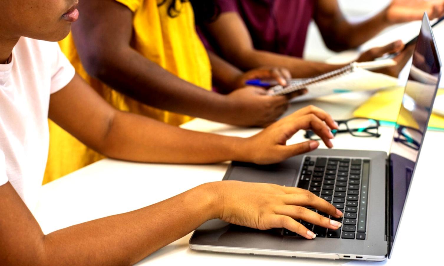 Finance team collaborating on budget planning with realistic documentation